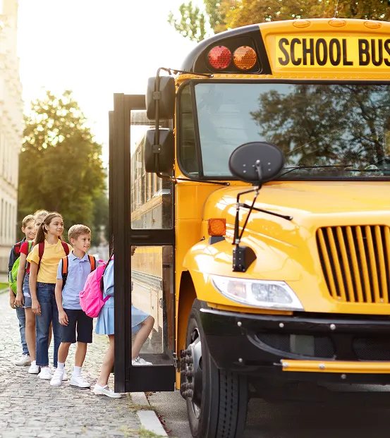 Kids getting on bus